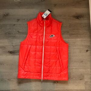 Bright orange nike vest